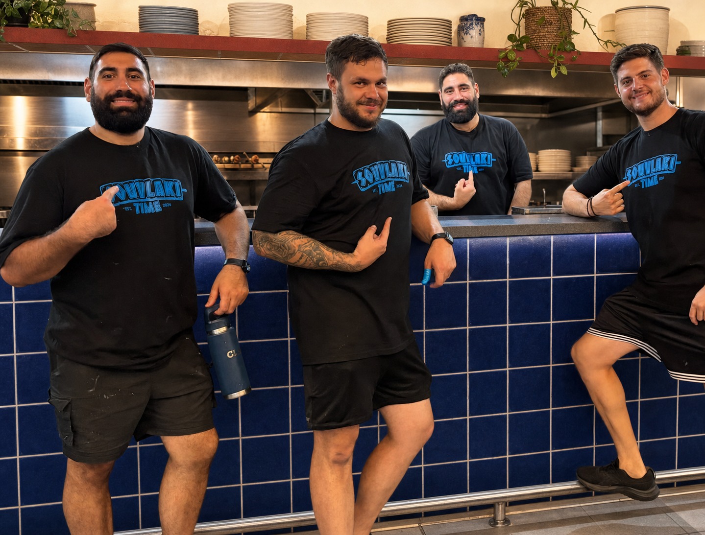 The Souvlaki Time crew together at their kitchen counter in Carina
